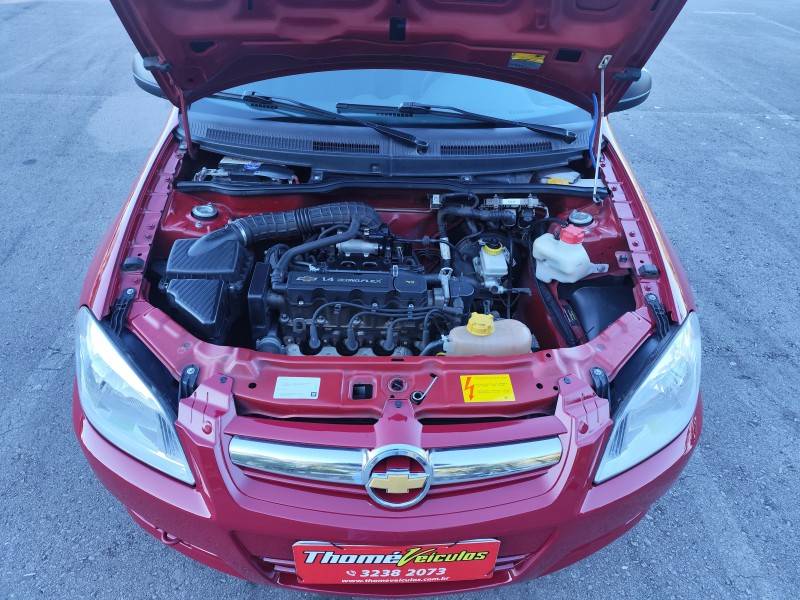CHEVROLET - PRISMA - 2010/2011 - Vermelha - R$ 29.900,00
