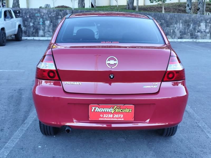 CHEVROLET - PRISMA - 2010/2011 - Vermelha - R$ 29.900,00