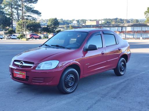 CHEVROLET - PRISMA - 2010/2011 - Vermelha - R$ 29.900,00