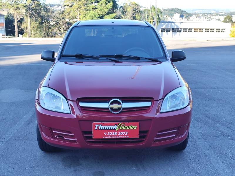 CHEVROLET - PRISMA - 2010/2011 - Vermelha - R$ 29.900,00