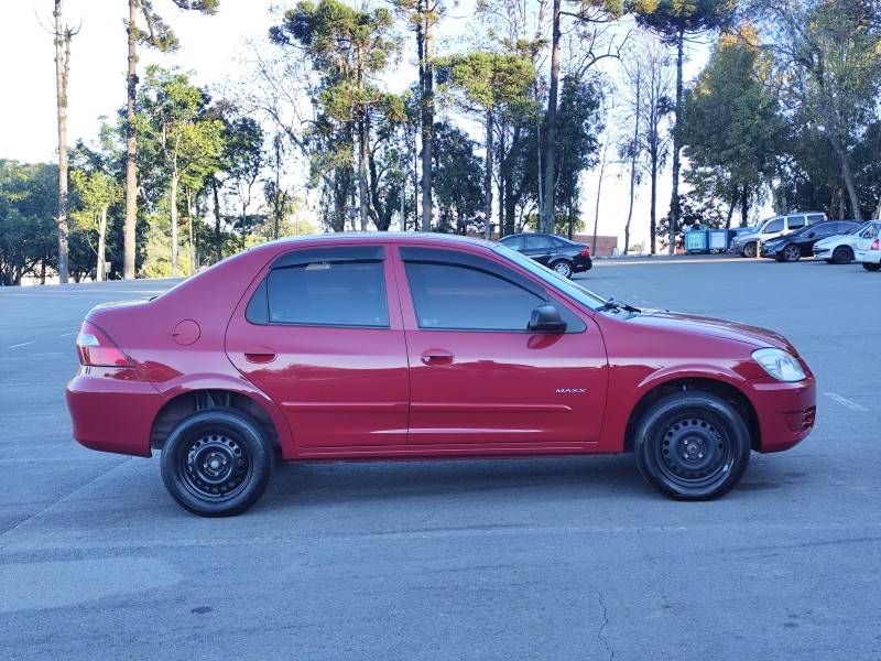 CHEVROLET - PRISMA - 2010/2011 - Vermelha - R$ 29.900,00
